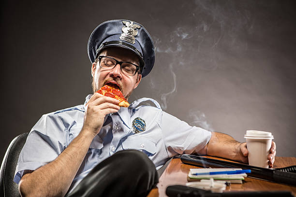 polizist auf kurzurlaub - humor badge blue crime stock-fotos und bilder