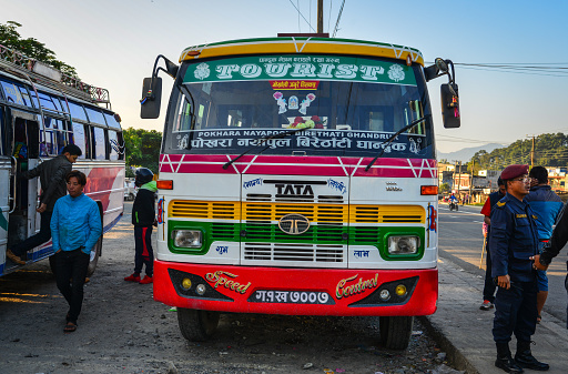 Pokhara, Nepal - Oct 20, 2017. A local bus waiting at station in Pokhara, Nepal. Pokhara is the starting point for most of the treks in the Annapurna area.