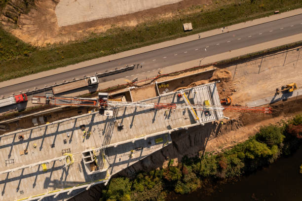 istock Drone photography of new office building construction site, cranes and construction workers 1748181239