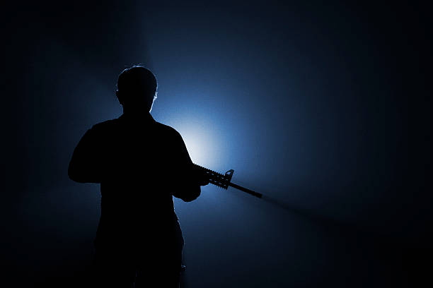 istock Assault Rifle Fog Silhoette 174818611
