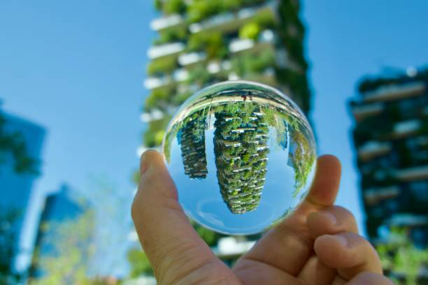 istock Crystal ball against city skyscrapers 1748190820