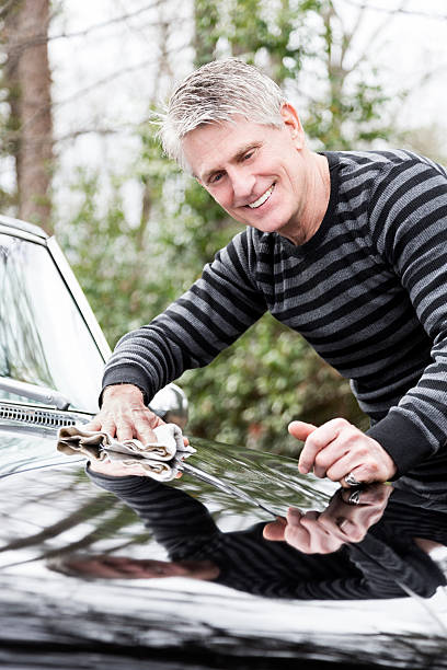 istock Senior Man Cleaning Car 174819351