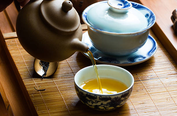 ティー - tea leaves chinese tea green tea tea ストックフォトと画像