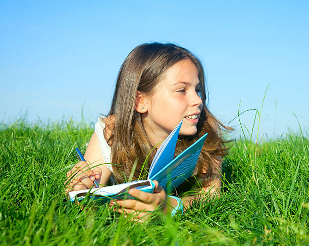 child taking note250 more pics of children and teens reading with this and other models clicking on any thumbnail:
