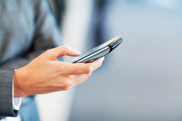 istock Businesswoman Using Smart Phone 174820014