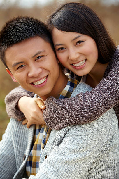 istock happy young Chinese couple together 174820368