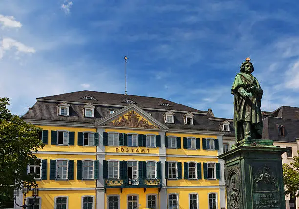 "The Beethoven Monument and the Postamt (post office) building on the Munsterplatz in Bonn, Germany."