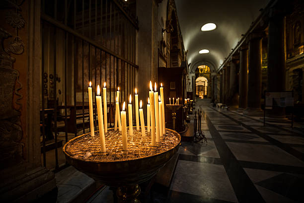istock Candles inside a church in Rome 174820918