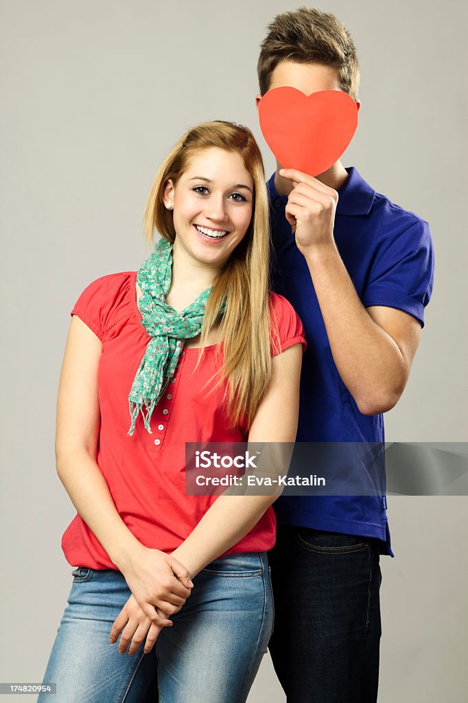 Funny moment Young couple posing at camera 16-17 Years Stock Photo