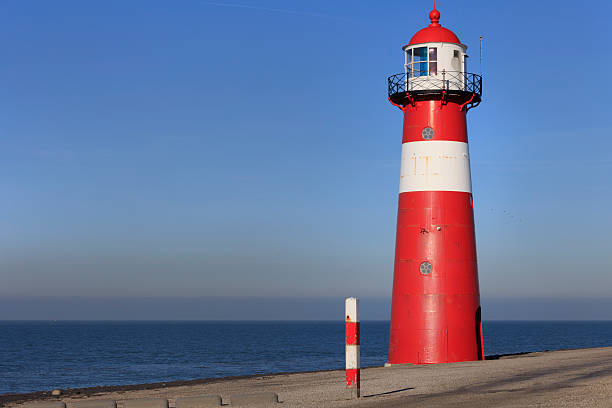 istock lighthouse of Westkapelle along the Dutch coast 174821334