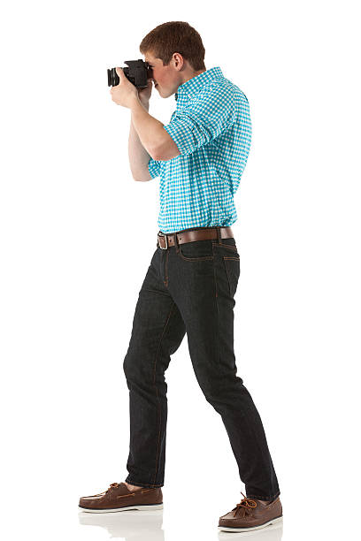 istock Photographer taking a picture with camera 174821424