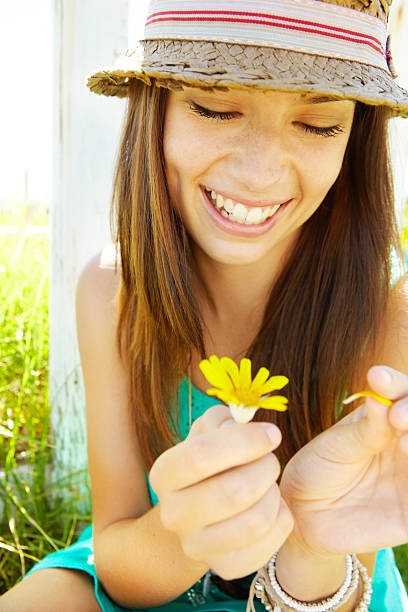 istock Pulling off petals in search of love 174821748
