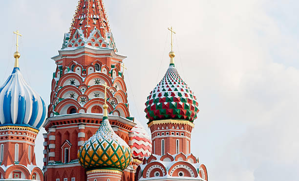 Onion Domes with Snow Close up of the domes of St. Basil's Cathedral dusted with snow onion dome stock pictures, royalty-free photos & images