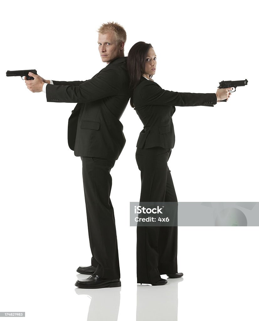 Agentes secretos com mão armas - Foto de stock de Duas pessoas royalty-free