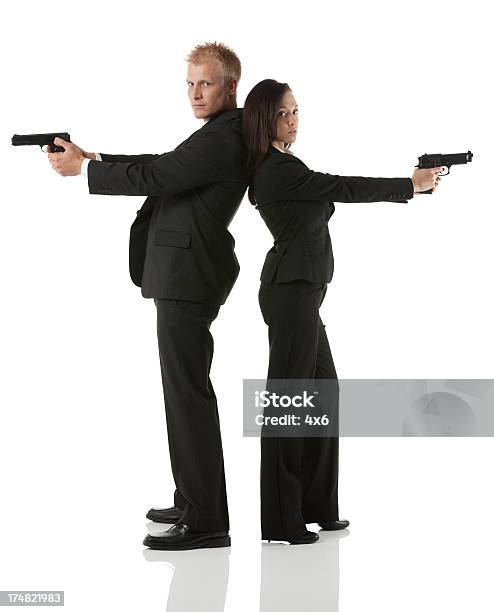 Foto de Agentes Secretos Com Mão Armas e mais fotos de stock de Duas pessoas - Duas pessoas, Espião, Homens