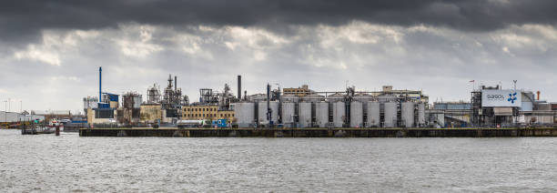chemical plants, port, container terminals harbor, and waterfront in hamburg, germany - harbor editorial industrial ship container ship imagens e fotografias de stock