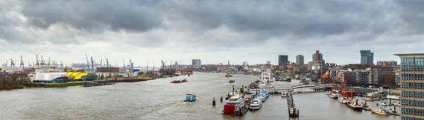 panoramic industrial view from elbphilharmonie viewpoint to the elbe river, chemical plants, port, container terminals harbor, and waterfront in hamburg, germany. - harbor editorial industrial ship container ship imagens e fotografias de stock