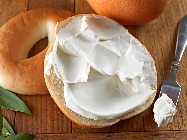 Bagel Bagel with Cream Cheese. cream cheese stock pictures, royalty-free photos & images