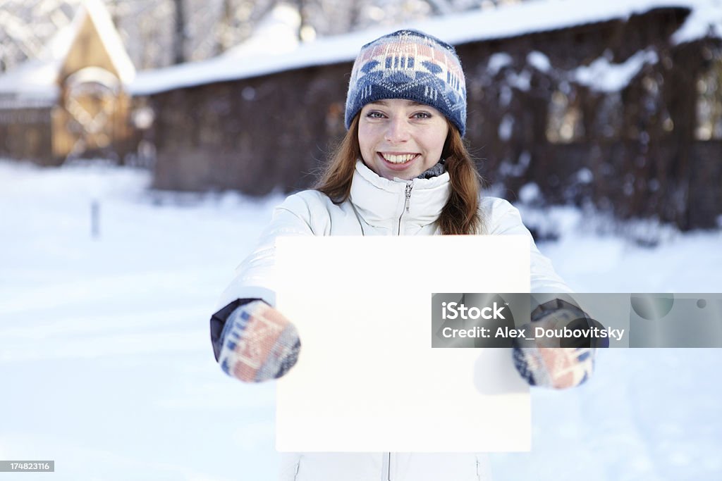 Inverno. Menina com banner em branco. - Royalty-free Adolescente Foto de stock