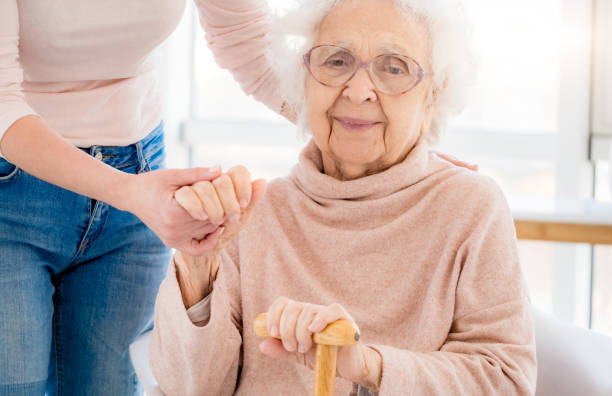 istock Grandmother supported by woman 1748232572