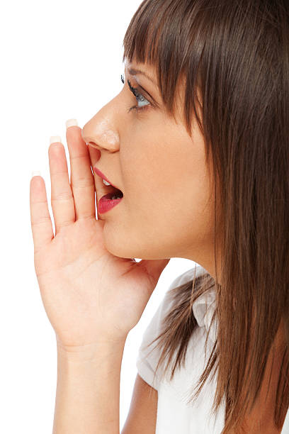 istock Young woman whispering 174823299
