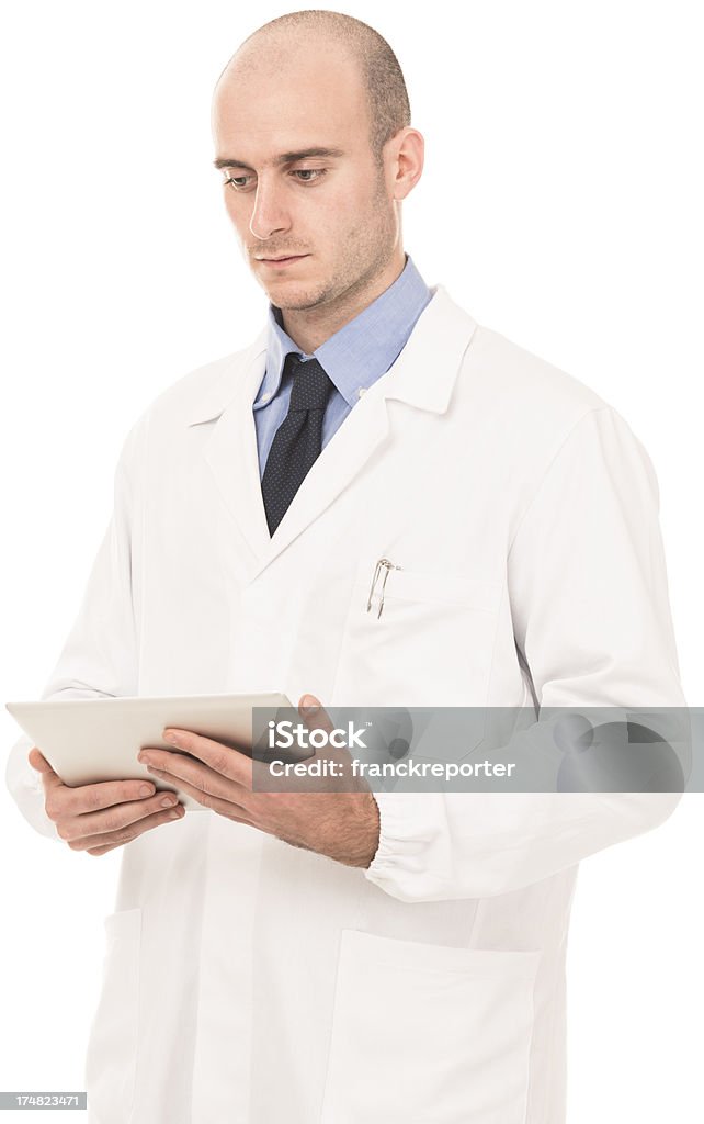 Grave médico usando a nova tecnologia tablet digital - Foto de stock de Adulto royalty-free