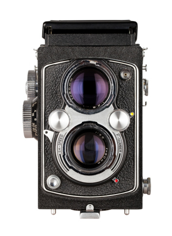 Old style photographic camera; medium format 6x6 cm. File includes clipping path.