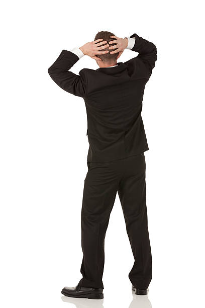 istock Businessman standing with his hands behind head 174823702