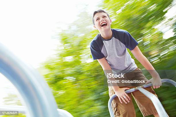 Photo libre de droit de Cest Fou banque d'images et plus d'images libres de droit de Enfant - Enfant, Tourniquet - Équipement d'aire de jeux, Afro-américain