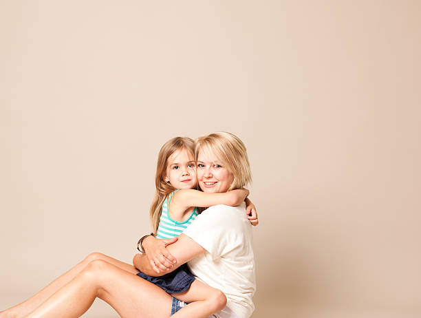istock Mother and Daughter Hugging 174824815