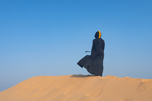 Arabic Woman in Black Dress in the Doha Desert, Doha Qatar