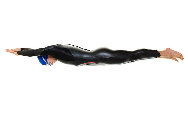 istock diving triathlete wearing neoprene swimsuit 174825297