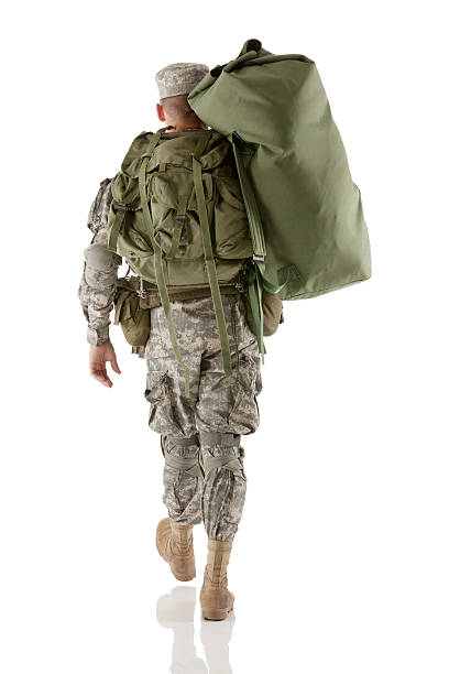10+ Rear View Of An Army Soldier Walking With Luggage Stock Photos