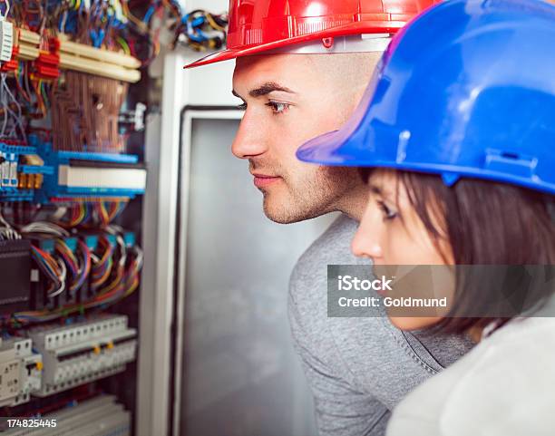 Patch Panel Inspection Stock Photo - Download Image Now - Factory, Network Connection Plug, 30-34 Years