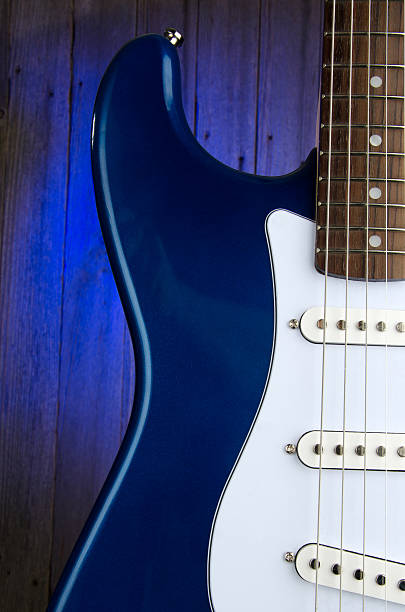 istock Electric Guitar on Blue Wood 174825859