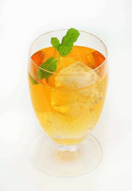 istock glass of apple juice with ice and mint 174826165