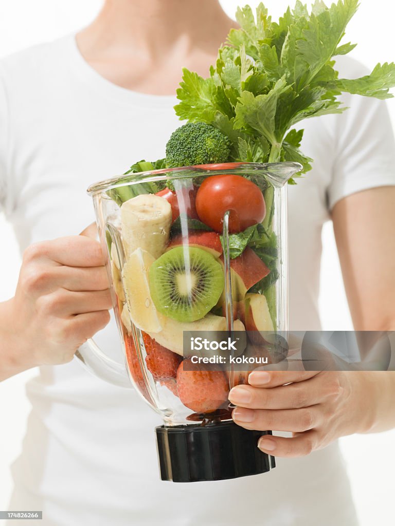 野菜 juicer を持つ女性 - アンチエイジングのロイヤリティフリーストックフォト