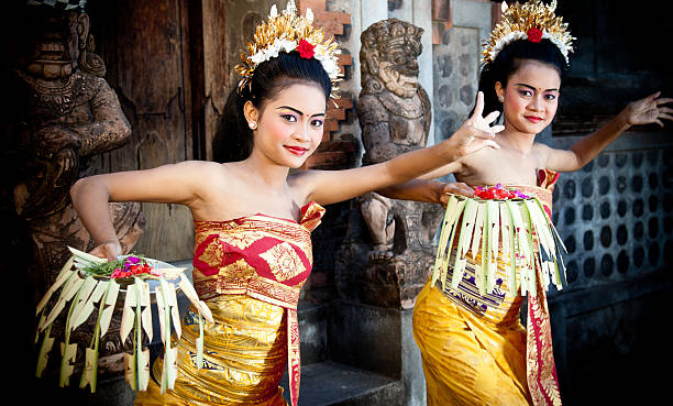 Two female Balinese dancers in their traditional costumes stock photo