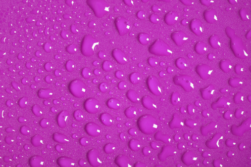 Water Drops on Pink Background.