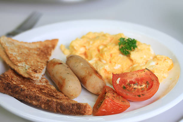 istock Breakfast plate with sausages and fried eggs 174826753