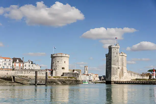 Towers guard the entrance to the beautiful city of La Rochelle. Tour de la Chaine and Tour Saint-Nicholas.