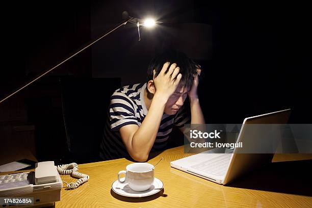 Asian Man Working On Laptop At Night Stock Photo - Download Image Now - Adult, Adults Only, Asian and Indian Ethnicities