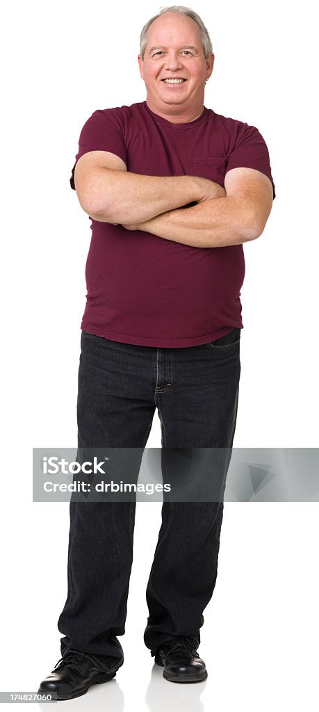 Happy Mature Man Standing Portrait Portrait of a mature adult man on a white background. Men Stock Photo