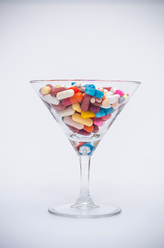 Many tablets in a martini glass