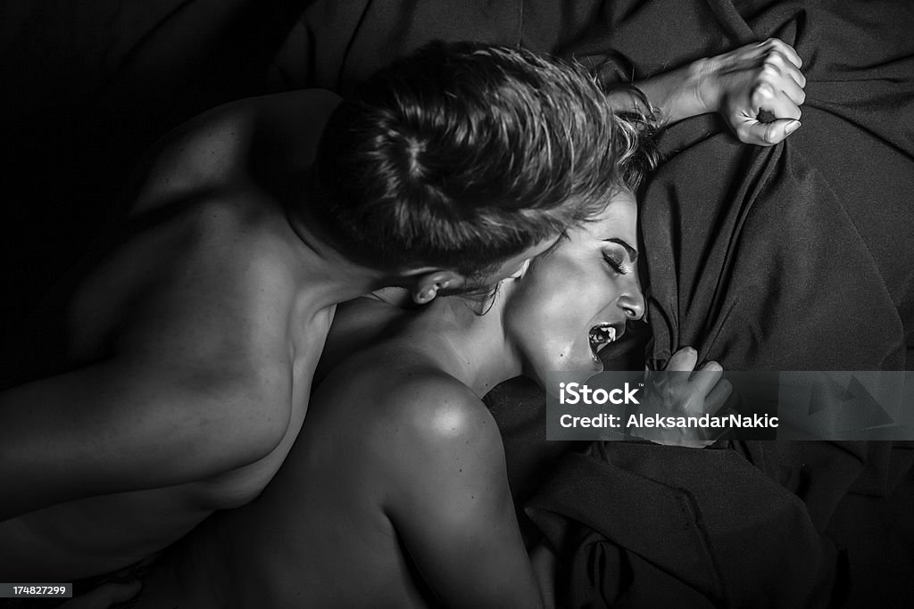 Passion Passionate love making Couple - Relationship Stock Photo