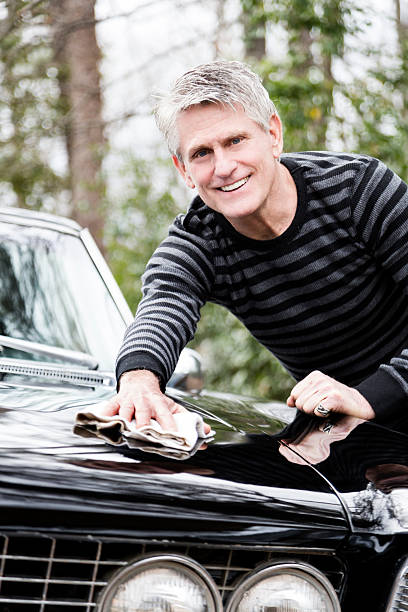 istock Senior Man Cleaning Car 174827446