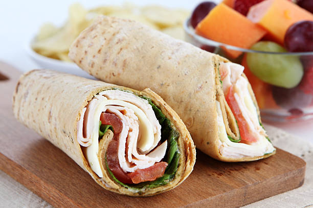 lunch wrap sandwich lunch aa wrap sandwich wrap sandwich photos stock pictures, royalty-free photos & images