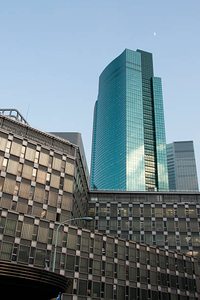 shinbashi grattacieli - shimbashi district skyscraper building exterior low angle view foto e immagini stock