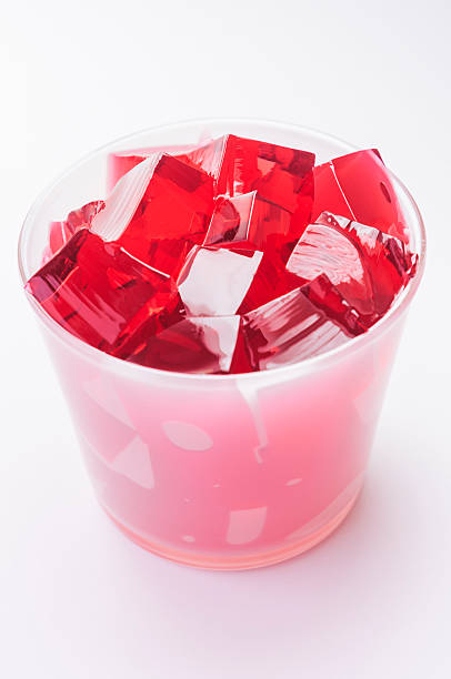istock Red jelly in a white drinking glass 174827928