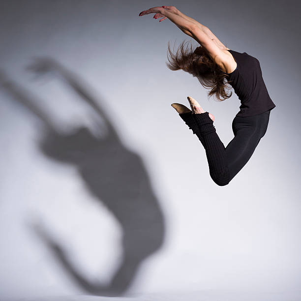 istock Women high jump on gray background 174828084